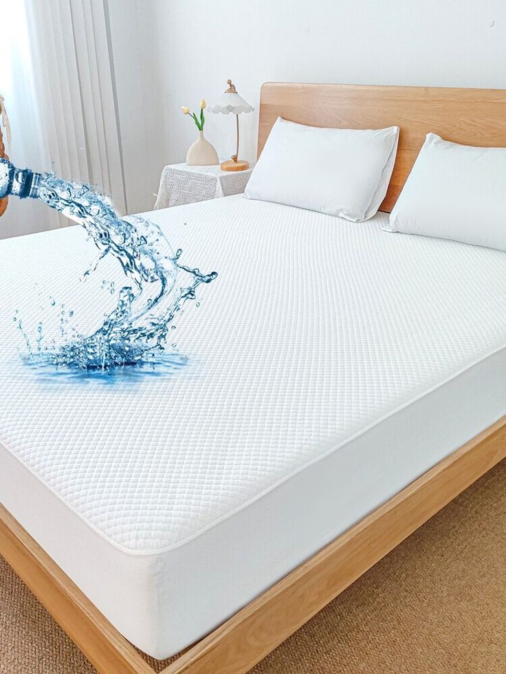 Minimalist white terry mattress protector